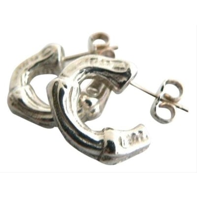 Tiffany And Co Sterling Bamboo Design Earrings: For sale is a pair of sterling silver, Tiffany and Co. chunky, pierced, hoop earrings featuring bamboo motifs and clutch back closures. Drop .6", Width 0.3"; All measurements are approximate. Hallmark