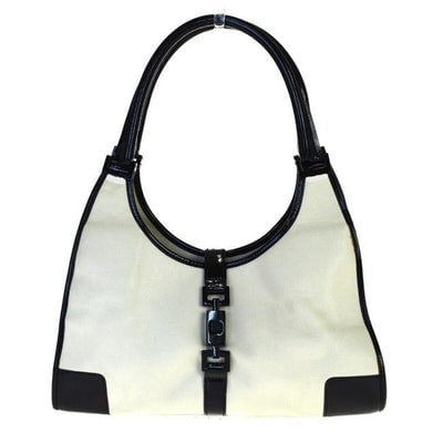 Gucci White & Black Leather Jackie Bardot Shoulder Bag: For sale is a Gucci, white leather and black patent leather, two strap, 'Bardot' style, Jackie- O bag with a black enamel, push button closure and black fabric logo print lining! It is the original 19