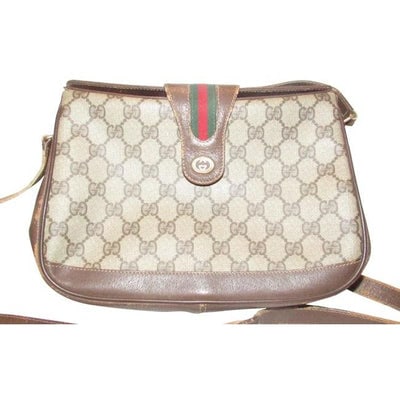 Gucci Vintage Accessory Collection Pursesdesigner Purses Brown Large G Logo Print Coated Canvasleath: For sale is a Gucci, brown, large G logo coated canvas & leather, multi-compartment, cross body/shoulder bag with red/green GG flap snap closure! This is a unique, rare piece from Gucci that will