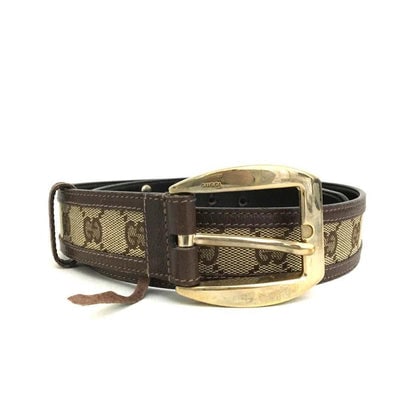 Vintage brown Guccissima leather belt with a gold G buckle: For sale is a mint condition, vintage, brown Guccissima print canvas & brown leather, size 80/32, unisex belt with a gold Gucci engraved buckle, & timeless style! The vintage, brown