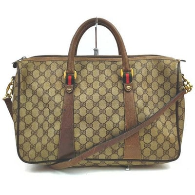 Gucci Speedy Xl Guccissima Leathercoated Two Way Brown G Printredgreen Leathercoated Canvas Satchel: * For sale is a RARE, Gucci, XL Two Way Speedy bag made of brown Guccissima print coated canvas and brown leather with red and green stripe accents, two flat leather handles, and a removable strap! Th