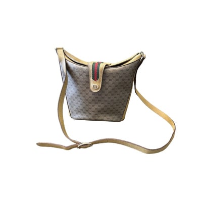 * For sale is a Gucci, RARE, brown micro Guccissima print coated canvas and leather, satchel/bucket: * For sale is a Gucci, RARE, brown micro Guccissima print coated canvas and leather, satchel/bucket style cross body/shoulder bag with a red and green Sherry striped, bold gold, top strap snap, gold h