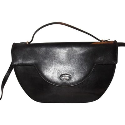 * For sale is a vintage, Bally, buttery black leather, two-way- satchel or shoulder bag/cross body: * For sale is a vintage, Bally, buttery black leather, two-way- satchel or shoulder bag/cross body with a detachable strap, top handle, avant garde shape and style, and gold hardware! It is a unique b