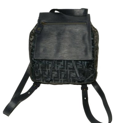 For sale is an AMAZING, Fendi, navy blue and grey Zucca print canvas and navy textured leather: For sale is an AMAZING, Fendi, navy blue and grey Zucca print canvas and navy textured leather backpack/ satchel/ messenger bag with brass hardware, exterior zip pockets, FF logo hardware, and a flap