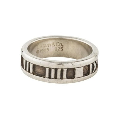 Amazing, Tiffany & Co., Atlas collection, sterling silver, band style, size 4.5, ring with an: Amazing, Tiffany & Co., Atlas collection, sterling silver, band style, size 4.5, ring with an intricate, engraved, Roman numeral design! This is a unique piece from Tiffany & Co. that would ma
