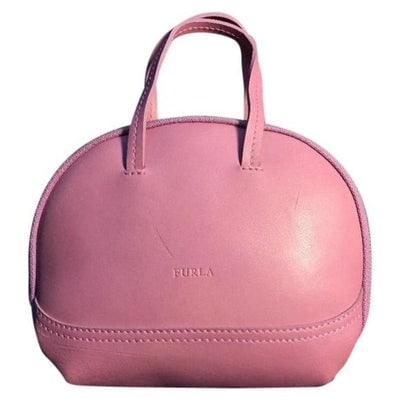 This Furla bowler-shaped satchel purse is crafted from bubble gum pink leather and features dual (1 of 4)