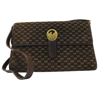 For sale is a RARE, early Gucci, brown suede with lighter brown small G logo print and brown: For sale is a RARE, early Gucci, brown suede with lighter brown small G logo print and brown leather, rectangular, two-way style- shoulder purse or clutch style with a bold, gold early GG logo snap st