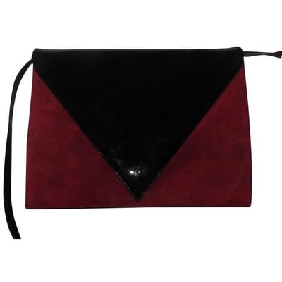 For sale is a vintage, Bally, red suede and black patent leather, two-way clutch or shoulder bag: For sale is a vintage, Bally, red suede and black patent leather, two-way clutch or shoulder bag with envelope top, removable strap, and an edgy avant garde look! The matching 7.5N kitten heels by Bal