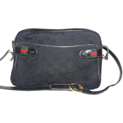 For sale is a Gucci, black large G logo print canvas and black leather with red and green striped: For sale is a Gucci, black large G logo print canvas and black leather with red and green striped snap accents, cross body/shoulder bag with compartments and an expandable, exterior front pocket! This