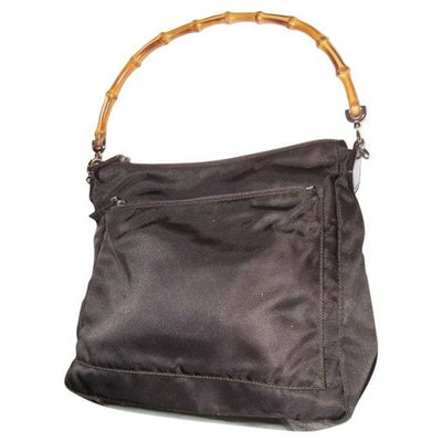 For sale is a unique, vintage, Gucci, large, dark brown canvas and leather, satchel with a bamboo: For sale is a unique, vintage, Gucci, large, dark brown canvas and leather, satchel with a bamboo handle, exterior pocket & chrome hardware! It is a classic style that would be a great used as a s