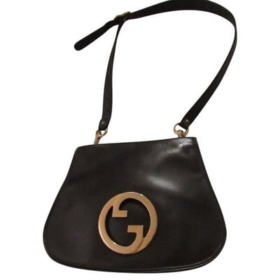 RE- RELEASED BY GUCCI!! For sale is a vintage, Mod, RARE, delicious, chocolate brown leather, Gucci: RE- RELEASED BY GUCCI!! For sale is a vintage, Mod, RARE, delicious, chocolate brown leather, Gucci 'Blondie', shoulder style, saddle bag with large, gold 'GG' emblem with fabulous bohemian, high end