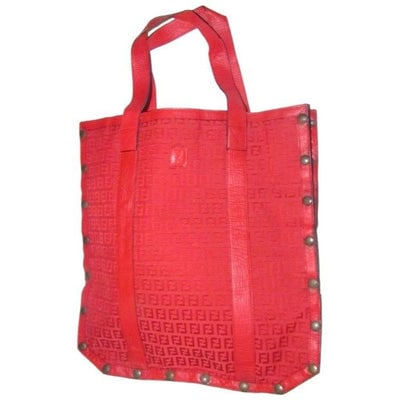For sale is an early FENDI, red Zucchino or small F logo print canvas and red textured leather XL: For sale is an early FENDI, red Zucchino or small F logo print canvas and red textured leather XL satchel or tote bag with two handles, sides that can be unsnapped for more space, an open top, and a u