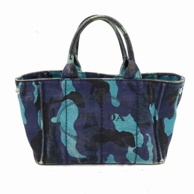 For sale is a RARE, Prada, 'Canapa', two-way style, top handle satchel or cross body/shoulder bag in: For sale is a RARE, Prada, 'Canapa', two-way style, top handle satchel or cross body/shoulder bag in a limited edition, camouflage print in shades of blue with XL PRADA logo on one side, two hard hand