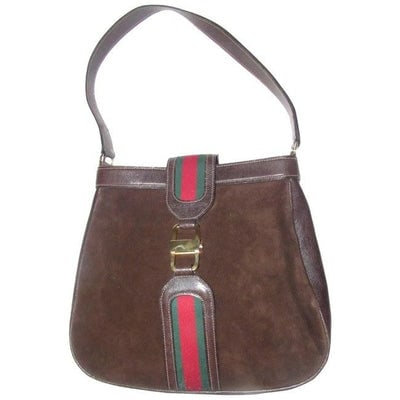One of a kind find!For sale is a vintage, early Gucci, RARE, bohemian/mod, dark brown suede and: One of a kind find!For sale is a vintage, early Gucci, RARE, bohemian/mod, dark brown suede and leather, saddle bag style shoulder purse with gold tone accents, a bold red and green striped strap that
