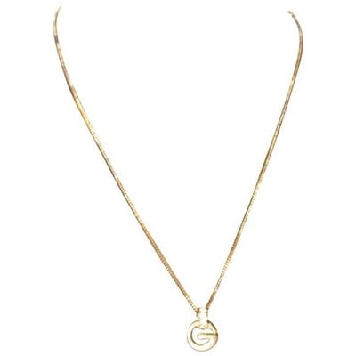 For sale is a NWT, Givenchy, 18" long , necklace with a gold 'G' shaped pendant with clear crystals,: For sale is a NWT, Givenchy, 18" long , necklace with a gold 'G' shaped pendant with clear crystals, a large lobster claw clasp closure, a 3" extender, and 'Givenchy' signature on the charm attached a