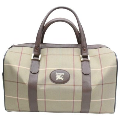For sale is an early Burberry's mod look, greenish-khaki, red, and cream plaid heavy canvas and: For sale is an early Burberry's mod look, greenish-khaki, red, and cream plaid heavy canvas and brown leather, XL satchel with two hard leather handles, an exterior pocket, and a footed bottom! It has