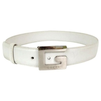 Gucci, white leather, Tom Ford era belt with an open center, chrome, square Gucci G logo buckle with: Gucci, white leather, Tom Ford era belt with an open center, chrome, square Gucci G logo buckle with a hook that slides into a hole to secure it, three holes that allow the belt to measure 26" to 28",