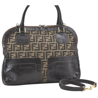 For sale is an early Fendi SAS, tobacco Zucco print canvas and brown leather, two-way style large: For sale is an early Fendi SAS, tobacco Zucco print canvas and brown leather, two-way style large satchel with two hard, rolled leather handles, a removable shoulder strap, gold hardware, two exterior