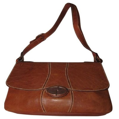 For sale is a GUCCI, buttery soft cognac brown leather, envelope flap snap/top closure, saddle style (1 of 4)