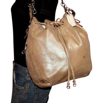 For sale is a GORGEOUS COACH Madison Marielle Leather drawstring shoulder purse! This bag is: For sale is a GORGEOUS COACH Madison Marielle Leather drawstring shoulder purse! This bag is beautifully made with thick super supple leather in a beautiful shimmery champagne with a crackled mirrored