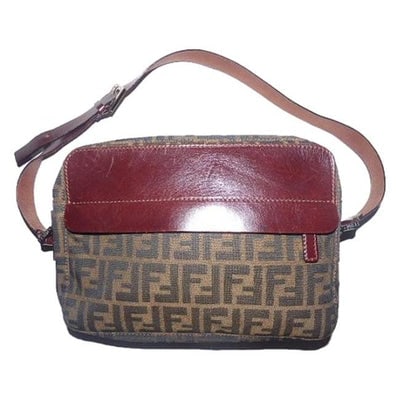 For sale is a vintage, Fendi, RARE, dark brown leather & black/brown large F logo canvas, (1 of 4)