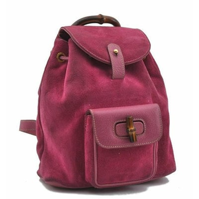 For sale is a Tom Ford era, Gucci, hot pink colored, suede and leather, messenger bag/backpack with: For sale is a Tom Ford era, Gucci, hot pink colored, suede and leather, messenger bag/backpack with an exterior pocket, drawstring top, two shoulder straps, a bamboo top handle, and gold and bamboo ac