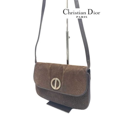 For sale is a vintage, Christian Dior, brown trotter print suede and brown leather, two-way style: For sale is a vintage, Christian Dior, brown trotter print suede and brown leather, two-way style shoulder purse or clutch with a bold, gold Dior CD logo snap closure, envelope top, multiple compartme