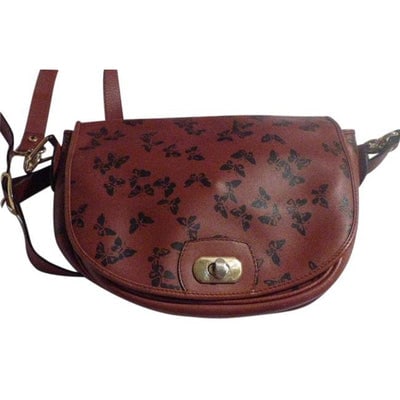 For sale is a Bottega Veneta, bohemian, RARE, embossed black butterfly print on rust brown colored: For sale is a Bottega Veneta, bohemian, RARE, embossed black butterfly print on rust brown colored leather, saddle bag style, envelope top, two-way style-cross body, shoulder bag, or clutch with a rem