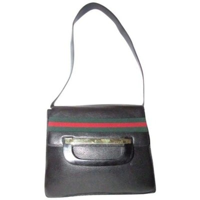 *For sale is an amazing, like new, RARE, Tom Ford era, Gucci, black leather two-way bag with a red: *For sale is an amazing, like new, RARE, Tom Ford era, Gucci, black leather two-way bag with a red and green stripe accent, envelope top, collapsible shoulder strap, and bold gold bar accent engraved