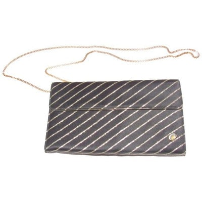Gucci Vintage Two Way Evening Purse Black Leather Shoulder Bag: For sale is an early, unique, Gucci, black silk and gold leather, envelope top, two way- handheld clutch or shoulder bag with three compartments, a removable gold chain strap, and metallic gold stripe