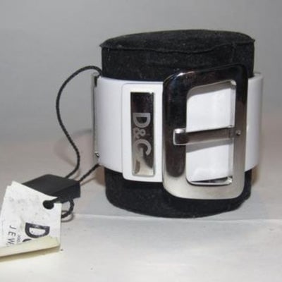 Dolce & Gabbana White Dense Lucite Plastic Chrome NWT: On trend! Substantial, white dense Lucite plastic and chrome 'D&G' center buckle clasp style bracelet with a 'D&G' engraved hinged buckle clasp that meets at the center with three settings, a