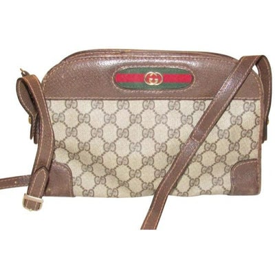 Gucci Vintage Gg Web Brown And Large G Logo Print Coated Canvas: * For sale is a Gucci, RARE, cross body or shoulder bag made of brown leather and Guccissima print coated canvas with a red and green striped fabric accent inlaid at the front of the purse with a gold