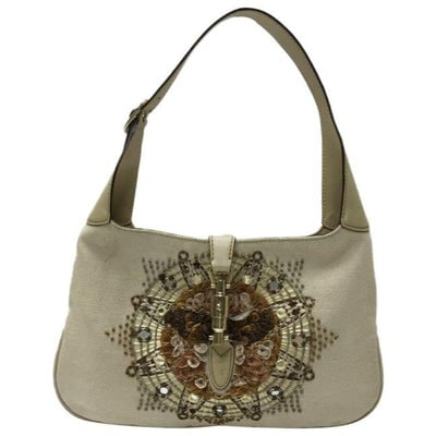 Gucci Hobo Jackie Beaded Limited Edition Purse Brown Leather Shoulder Bag: For sale is a Gucci, Limited Edition, Jackie- O style, medium size, hobo style shoulder bag, made from canvas and stone leather with an elaborate beaded and stitched design, a gold piston closure, and