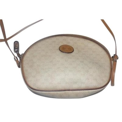 ON SALE! Gucci Camel On Ivory Micro Guccissima Print Crossbody: For sale is a vintage, Gucci, ivory coated canvas with a camel micro Guccissima print and leather, oval, sling style, cross body/shoulder bag with a top zip closure and gold accents! A quality classic