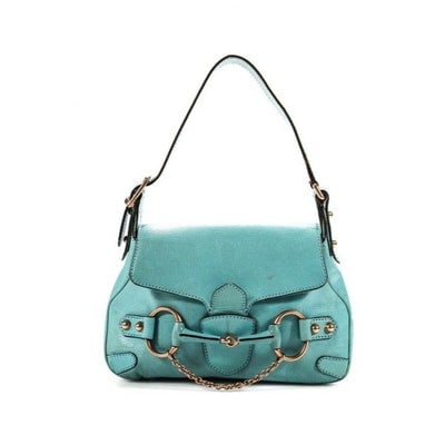 Gucci Turquoise Leather Horse-bit Chain Saddle Bag: Re-Released by Gucci!For sale is amazing, Gucci, turquoise leather and antique gold hardware, Horse-bit Chain style shoulder bag with a shoulder strap, chain accent, and bold antique gold, equestrian