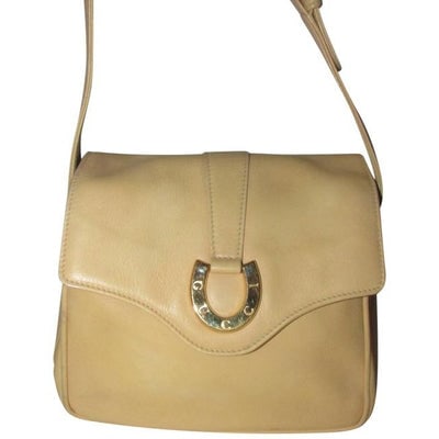 Gucci Horsebit Vintage Pursesdesigner Purses Buttery Pale Yellow Colored Leather Shoulder Bag: * Please don't hesitate to make a reasonable offer. I am always willing to negotiate! ? ** For sale is an early, rare, GUCCI, buttery pale yellow colored leather, single strap, satchel style, shoulder