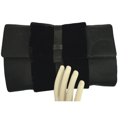 1950's G. Gucci silk & velvet clutch: One of a kind vintage Gucci evening bag! For sale is a vintage, one of a kind, Gucci, black silk & velvet over leather, clutch, with a linear Art Deco design, gold hardware, and an Avant Garde bow