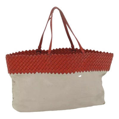 Bottega Veneta tomato red & ivory color block multi-color leather Cabat tote bag: For sale is a Bottega Veneta tomato red woven leather and ivory / taupe leather tote bag with gunmetal chrome hardware, a soft suede lining, lots of room, and a great, timeless style! Dimensions: 17.5
