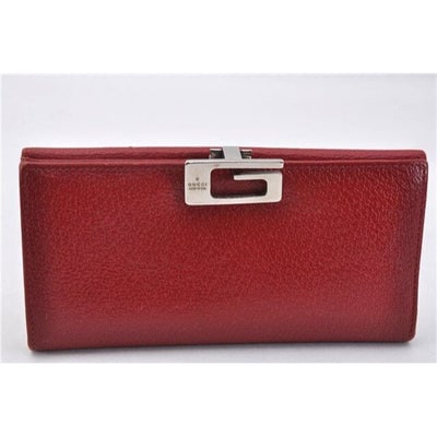 Gucci red leather wallet w square silver G clasp: For sale is a RARE, Gucci, Tom Ford era, red leather XL continental bi-fold wallet with a square, silver Gucci logo clasp, lots of cards slots, and a zip close change purse! This is a great looking, c