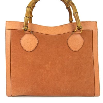 Gucci Orange Suede And Leather Diana Tote Bag Shopper W Bamboo Handles: Just re-released by Gucci as the Diana for ~ $3K- $4K!* For sale is a vintage, mod look, Gucci, orange suede and textured leather, classic style tote or shopper with two bamboo handles, a footed botto