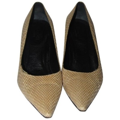 Gucci Champagne Colored Snakeskin Leather Pumps: For sale is a pair of like new, Gucci, size 10B, champagne colored leather, closed, pointed toe, 4" stiletto heels with their original box! A perfect look for you with a lot of style! The shoes are
