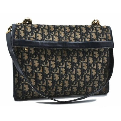 Dior And Handle Navy Black Trotter Print Leather And Canvas Shoulder Bag: ONE OF A KIND VINTAGE DIOR PURSE!! For sale is a RARE, Christian Dior, navy and ivory trotter print canvas and navy glossy leather, shoulder/ cross body with multiple compartments, an envelope top, sn