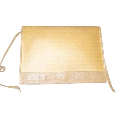 Fendi dark yellow Zucchino print two-way purse w FF trim: For sale is an early Fendi, dark yellow Zucchino print coated canvas and camel leather, two-way- clutch, cross body, or shoulder bag with an envelope top, perforated FF trim, and an adjustable or