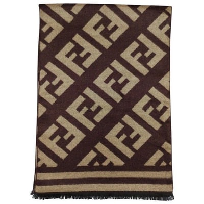 Fendi Brown Tan Zucca Print Logo Cashmere Scarf: This piece looks like it is from Fendi's 2021- 2022 line! For sale is a Fendi Zucca logo print, 12" x 72", 100% cashmere scarf in brown with a tan Zucca logo design, short, .5" long fringe, and a supe