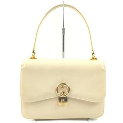 Gucci mod cream leather 1973 top handle bag: For sale is a unique, RARE, Gucci, mod, cream leather, single strap, top handle style purse with gold tone accents and lots of pockets! It is a unique style that would be a great used as a signature