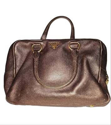 Prada pink rose gold leather large size satchel style shoulder bag: For sale is an authentic, Prada, pink rose gold leather, retro, large size, gorgeous, satchel style, shoulder bag with a zip top closure, dual shoulder straps, and a buckled front tag, loc