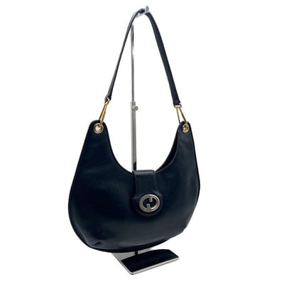 Vintage, rare, midnight blue leather, Gucci shoulder bag with a large, two-tone 'GG' emblem and (1 of 4)