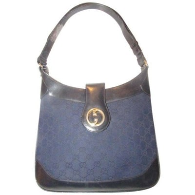 Gucci Vintage Pursesdesigner Purses Camel Leather With Gold Gg: ONE OF A KIND VINTAGE GUCCI! For sale is a unique, mod, Gucci, navy Guccissima print canvas and black leather, vintage, '1973' style, top handle shoulder bag with a bold gold GG accent on flap snap cl