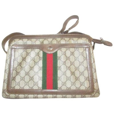 Gucci Guccissima Print Brown Two Way Coated Canvas Leather Multi Compartment: *** THE SAME STYLE HAS BEEN RE-RELEASED IN GUCCI'S CURRENT LINE! *** For sale is a vintage, Gucci, RARE, brown large G logo coated canvas & brown leather messenger style, shoulder bag with a wide 