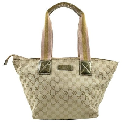 Gucci Gg Supreme Guccissima Canvas Leather With Sherry Stripe Straps Tan G Print Pink Bronze: For sale is a Gucci, tan Guccissima print canvas and bronze metallic leather XL satchel or tote style bag with a zip top closure, tapered shape, a square, leather bottom, pink/bronze striped fabric wi